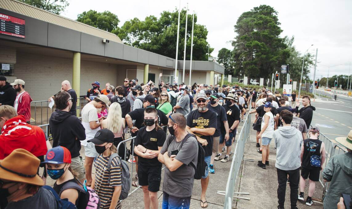 Queues of masked fans wait at the gates for Summernats to open to the public. Picture: Dion Georgopoulos