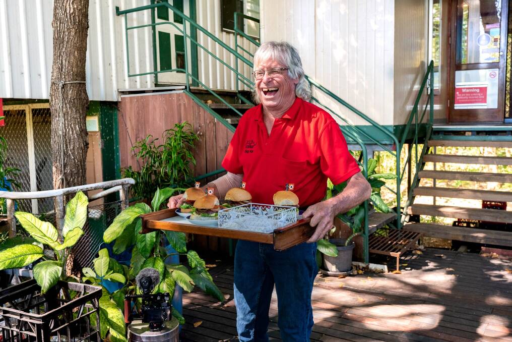 Kai Hansen bringing out his buffalo burgers at his bar on Goat Island. Kai Hansen bringing out his buffalo burgers at his bar on Goat Island.