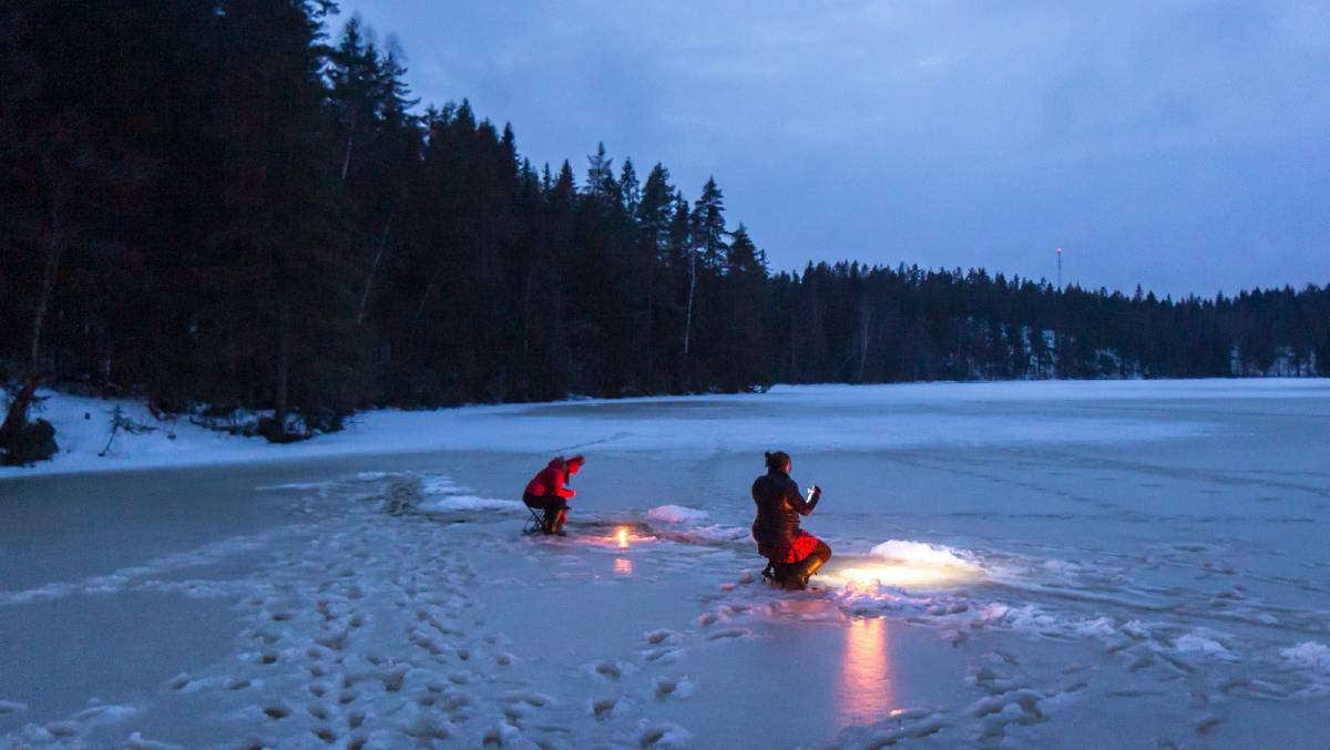 We head out onto the frozen lake to try our hand at ice fishing. We head out onto the frozen lake to try our hand at ice fishing.