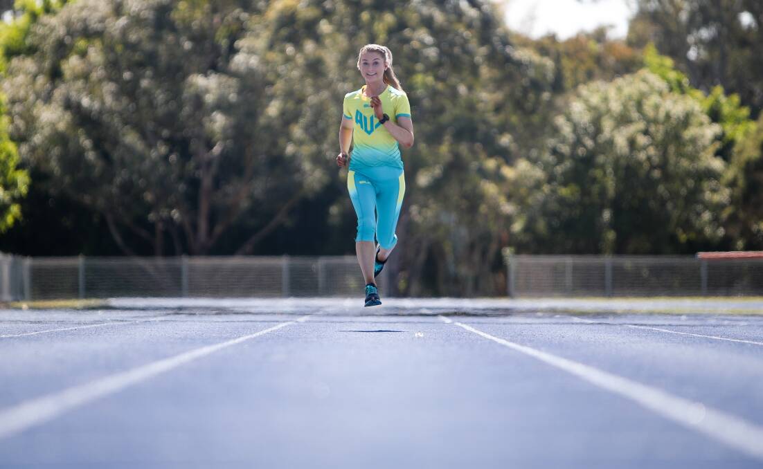 Green and bold: Albion Park's Jessica Hull set a 5000m Olympic qualifying time at the Melbourne Track Classic. Picture: Adam McLean