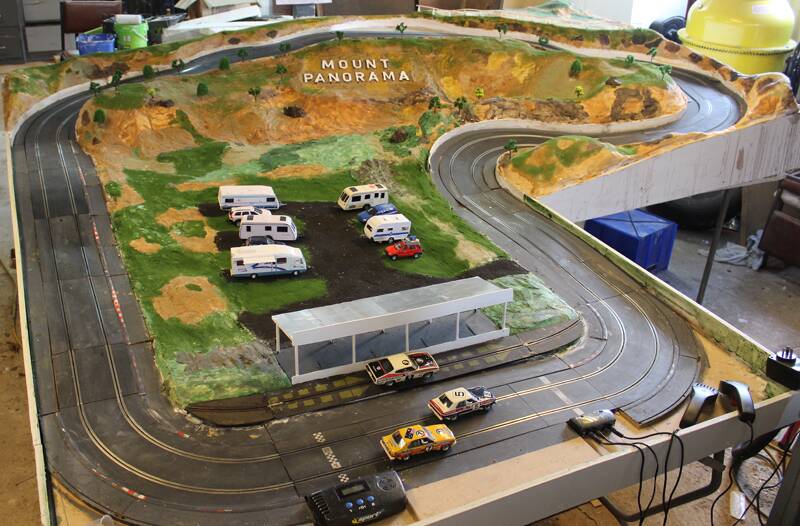 ATTENTION TO DETAIL: Cootamundra resident Barry Gavin has spent six months building this working slot car track of Mount Panorama, which is almost complete. Photo: SUPPLIED