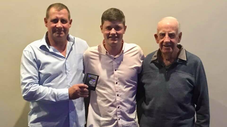 Paul Miller, his son Tom Miller and father Clive Miller at the Bulldogs awards presentation night on Friday.