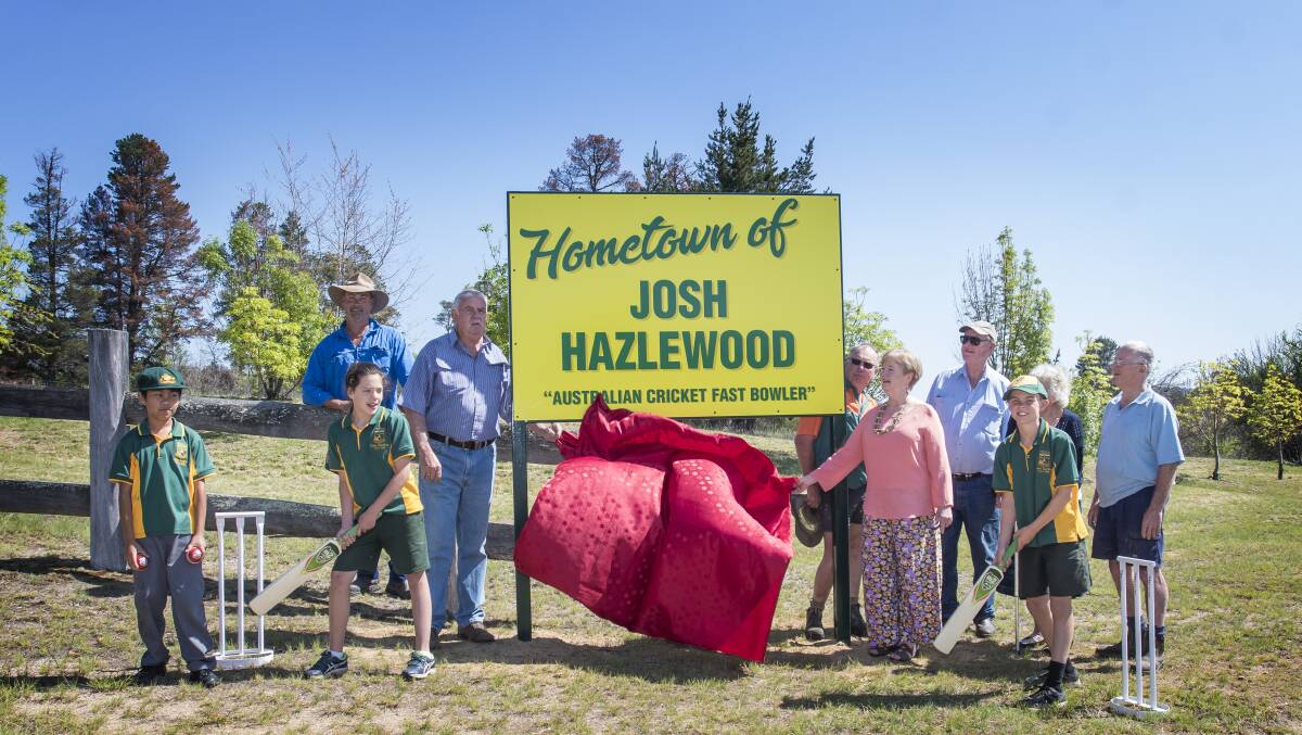 PRIDE AND JOY: Bendemeer residents with the sign when it was unveiled in 2018. Photo: Peter Hardin, file.