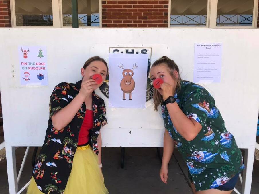 CHRISTMAS CHEER: Students Chelsie Manwaring and Eliza Cooper. Picture: supplied