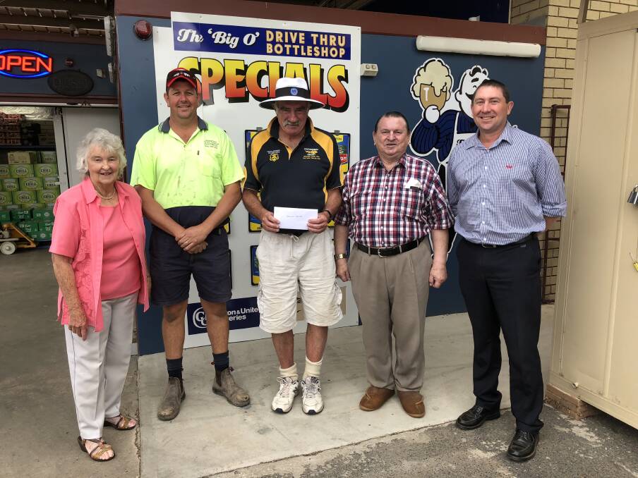Sporting club representatives received cheques from The Big O bottleshop owners the Daleys. Pictured are Lola Daley, Brendan O’Callaghan, Pat Kerin, Keith Daley, Matt Holt.