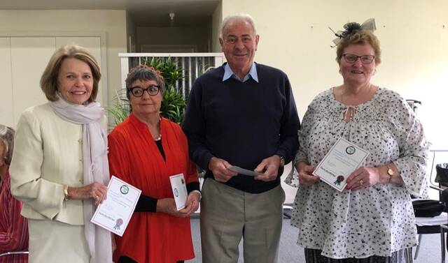 SUCCESSFUL: Cootamundra Bridge Club members Gail Flanery, Jude Hillam, Frank Davidson and Jenny McAinsh display their certificates for winning the recent Australia-Wide restricted pairs event. Picture: Supplied