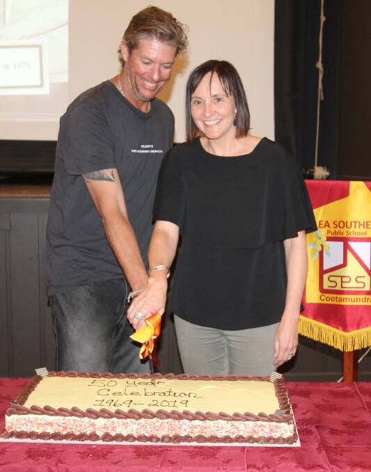 School captains in 1988, Skye Mendl (Sargent) and Brad Bateup cutting the cake at the 50th anniversary dinner at the Ex-Servicemen's Club last Saturday night.