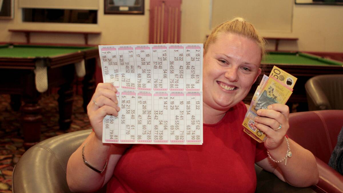 WINNERS ARE GRINNERS: Courtney Smith was thrilled to be the Bingo winner at the recently held Cash Bingo CanAssist fundraiser hosted by the Ex-Services Club.