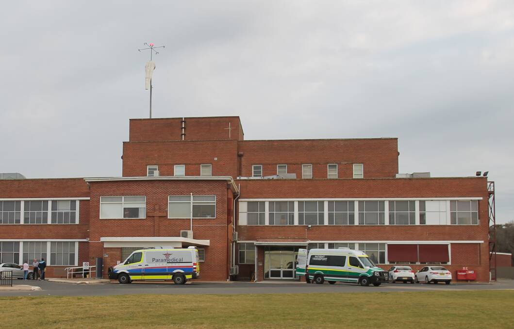 Ambulance transport vehicles outside Cootamundra hospital - patients are regularly being transported elsewhere to get attention from a doctor.
