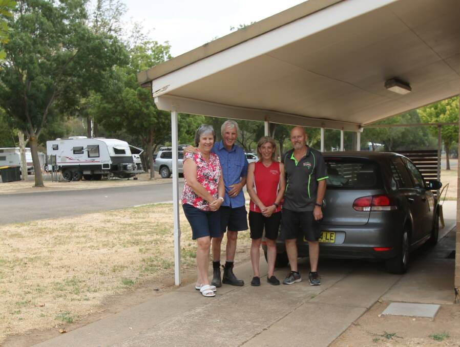 Linda and Frank Basten (left) with Bruna and John Nicholson, operators of the Cootamundra Caravan Park, at the unit where the Bastens are staying. 