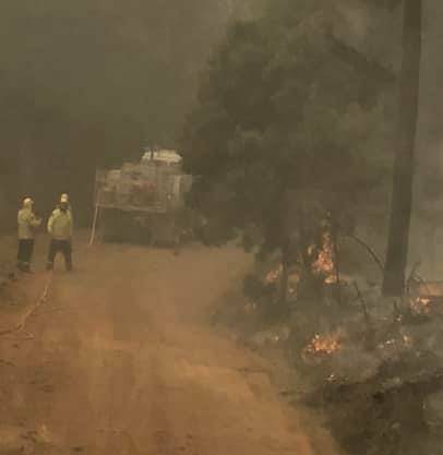 Adelong RFS brigade at Dunns Road fire. Cootamundra crews were being sent daily to nearby Ellersleigh until Monday. Picture: Adelong Rural Fire Brigade