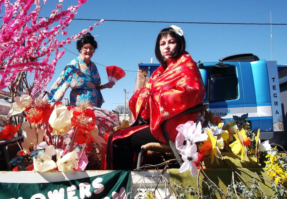 Cherry blossom and geishas adorned the Garden Club float in the Wattle Time parade.