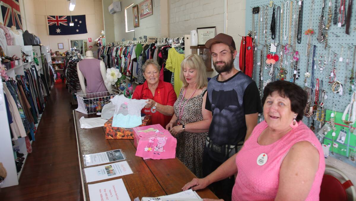 Busy start to year: At the Red Cross shop, Helen Eccleston (left) with Sharon Douglas, Aaron Moore and Michele Radnedge.