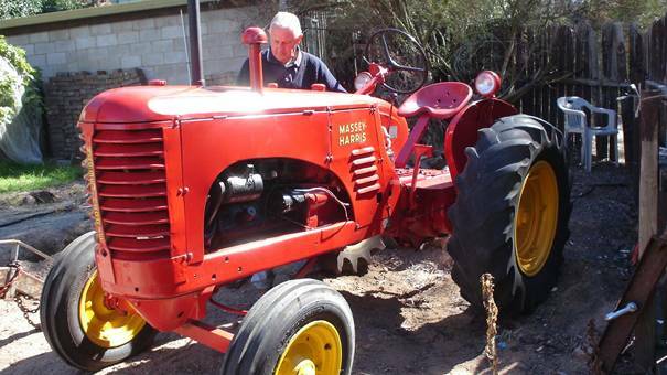 CDMRS Secretary Lyell Constance prepares his antique tractor for the clubs upcoming rally and tractor pull.