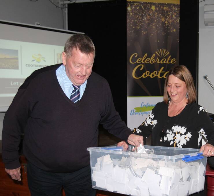 Maor Abb McAlister drew the winning entry for the Celebrate Coota Shop Local campaign, Judith Quinn.