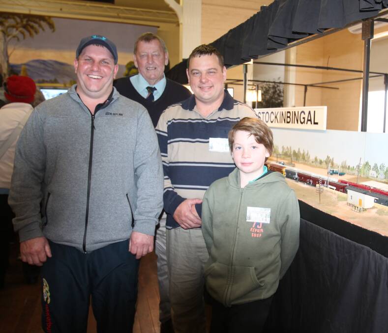Billy Everett (left) with mayor Abb McAlister and Rod and Aiden Smith. Models doing the circuit, some brought by other enthusiasts, were all of NSW freight trains.
