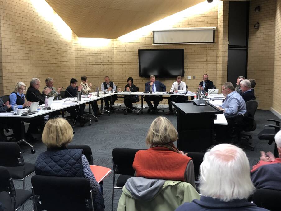 Bricks and mortar: Council's meeting at Gundagai in September last year - this month, and possibly for some months to come, they'll be physically apart.