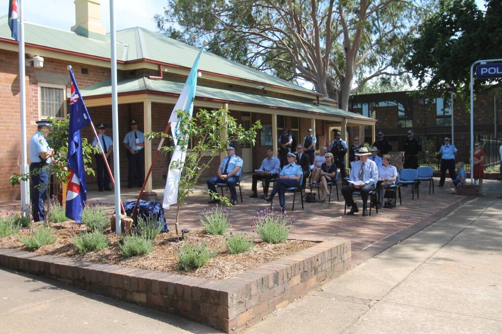 This morning's Police Remembrance Day gathering at which a plaque was unveiled in front of Cootamundra Police Station.