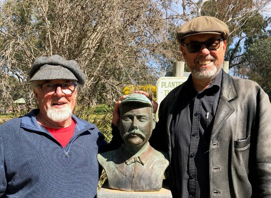 Authors Richard Cashman and Ric Sissons with bust number two on at Cootamundra's Captains' Walk - Billy Murdoch.