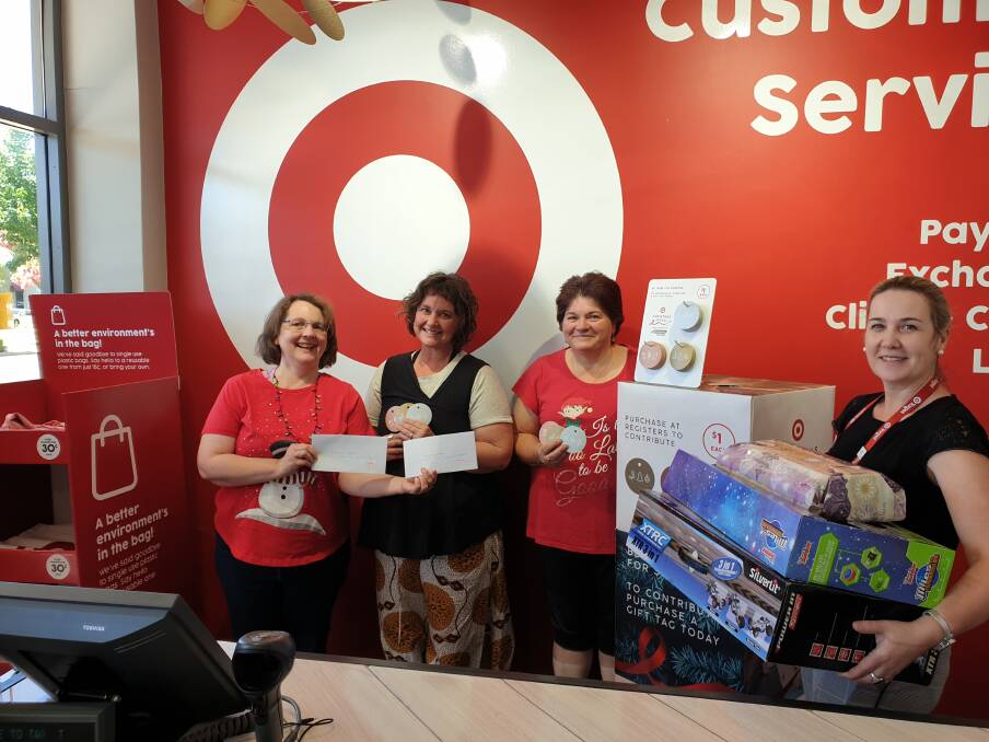 Uniting Church volunteer Ros Robinson with Community Hub's Samantha McNally, Salvos manager Kate O'Brien and Target manager Debbie White. Picture: Keith Robinson