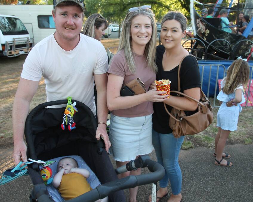 Easy rider: Bodhi Prosser (four moths) with Jacob Prosser, Ashlea Crowe and Rachele Dowell