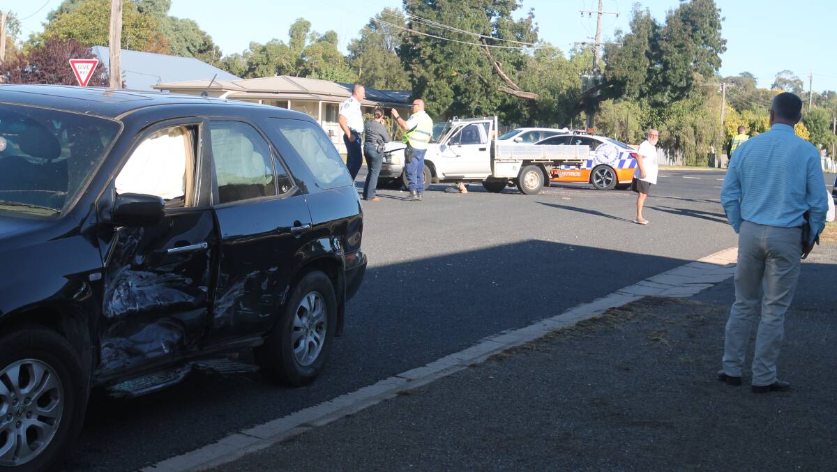 The Honda SUV in the foreground, with damage to the front passenger door where the Hilux ute with four people in the front cabin attempted to 'undertake' at the corner of Lawrence and Sutton streets.