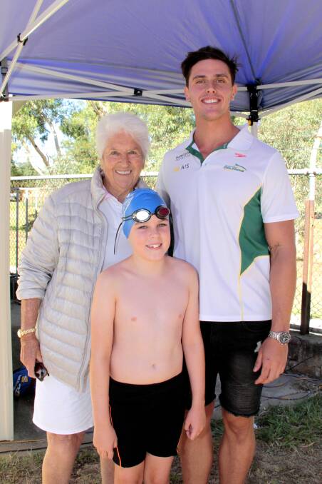 After the swim of his life, Archie Blackman pictured with Dawn Fraser and Kurt Herzog. Picture: Kelly Manwaring