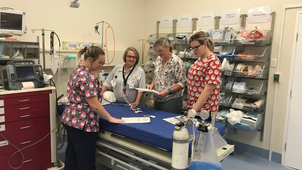 Hailey Freer, Sue McGlynn, Jocelyn Piper and Alicia McGuiness checking equipment in the new ED. On weekdays the ED now has a 'virtual GP' providing clinical support directly to the bedside via telehealth. 