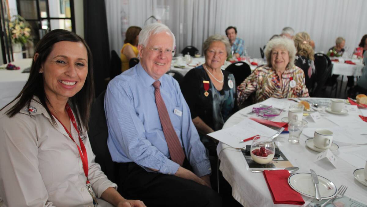 At Wednesday's luncheon, Megan Norton, Red Cross senior administrative officer at Wagga and Ross Pinney, Red Cross Australia president, with Helen Eccleston, Cootamundra Red Cross member and Betti Punnett, patron.