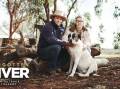 Brendan and Jacinta Cullin with their dog at their homestead in Kars Station, NSW. Picture: Dion Georgopoulos