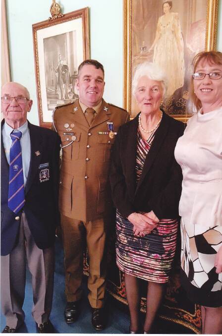 HONOUR: John Simpfendorfer, Warrant Officer First Class Paul Simpfendorfer, Maureen Simpfendorfer and Kylie McIntyre attend the OAM investiture ceremony in Melbourne's Government House.