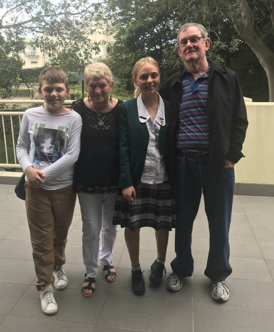 LEADER: Cootamundra's Pat Ballard (right) with Hayley Minogue, Chris Delahunty and Jack Minogue at Brigidine College for Hayley's induction as school captain.