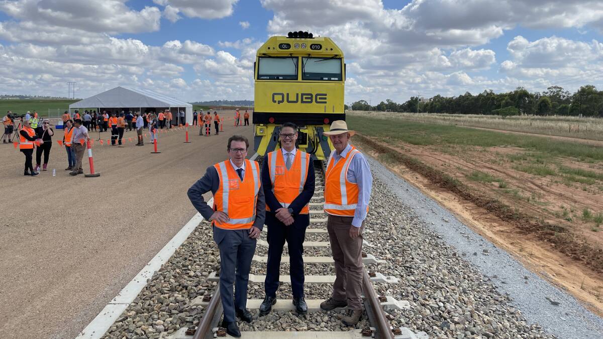 ROLLING: Wagga MP Joe McGirr, Nationals MLC Wes Fang and Wagga mayor Greg Conkey on the Riverina Intermodal Freight and Logistics Hub's rail siding. Picture: Rex Martinich