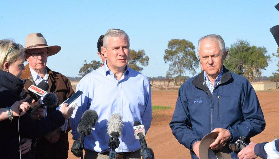 Riverina MP and Deputy PM Michael McCormack and PM Malcolm Turnbull announce further federal drought aid at Trangie on Sunday. Picture: Twitter/Michael McCormack