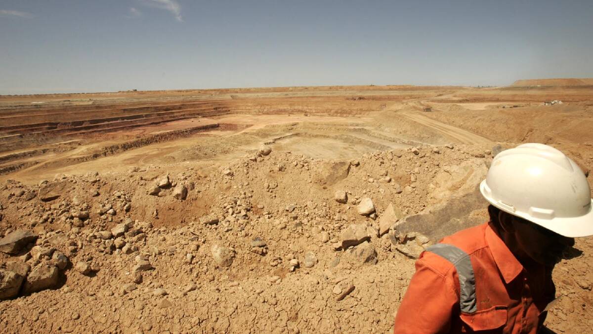 A worker at the Lake Cowal gold mine near West Wyalong. The mine's owner, Evolution Mining, has taken steps to reduce the threat of coronavirus.