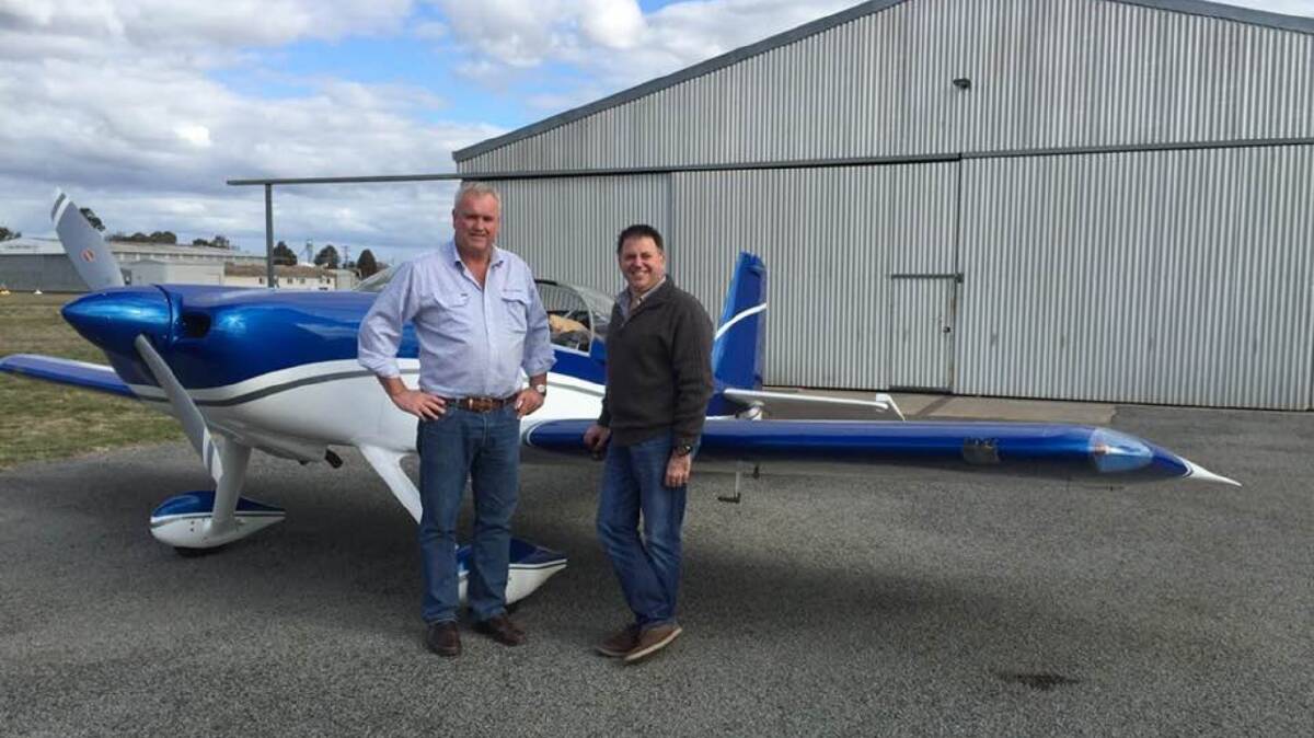 FLIGHT CREW: Cootamundra’s Phil Hines and Dr Jacques Scholtz with the two-man RV7 plane that they used to take part in the Outback Air Race.