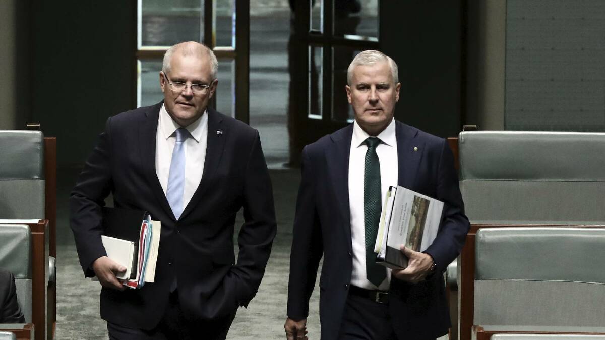 Prime Minister Scott Morrison and Deputy Prime Minister Michael McCormack in Parliament House for the release of the federal budget on Tuesday. Picture: Dominic Lorrimer