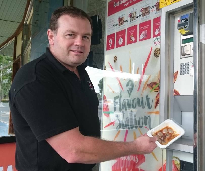 Sutton Street Store owner Peter Nolan with a hot meal from the first lamb vending machine in Australia, installed in late 2016 for about 12 months.