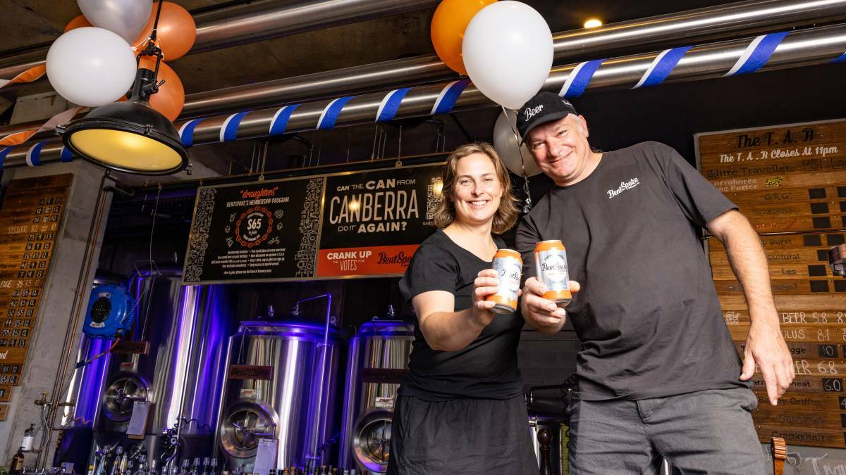 Championing locals: BentSpoke co-founders Tracy Margrain and Richard Watkins toast their success after being named Australia's favourite craft beer in January. Picture: Sitthixay Ditthavong