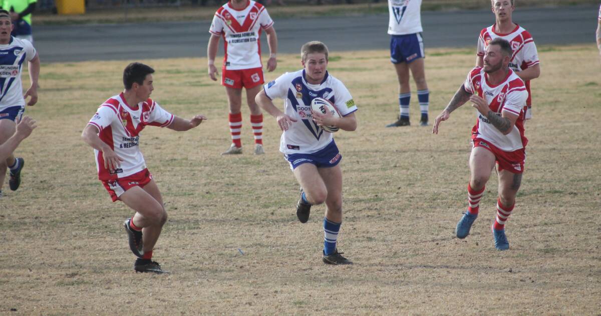STRAIGHT THROUGH: Cootamundra's James Smith makes a break during the Bulldogs' 30-10 loss against Temora on Saturday. Picture: Lachlan Grey