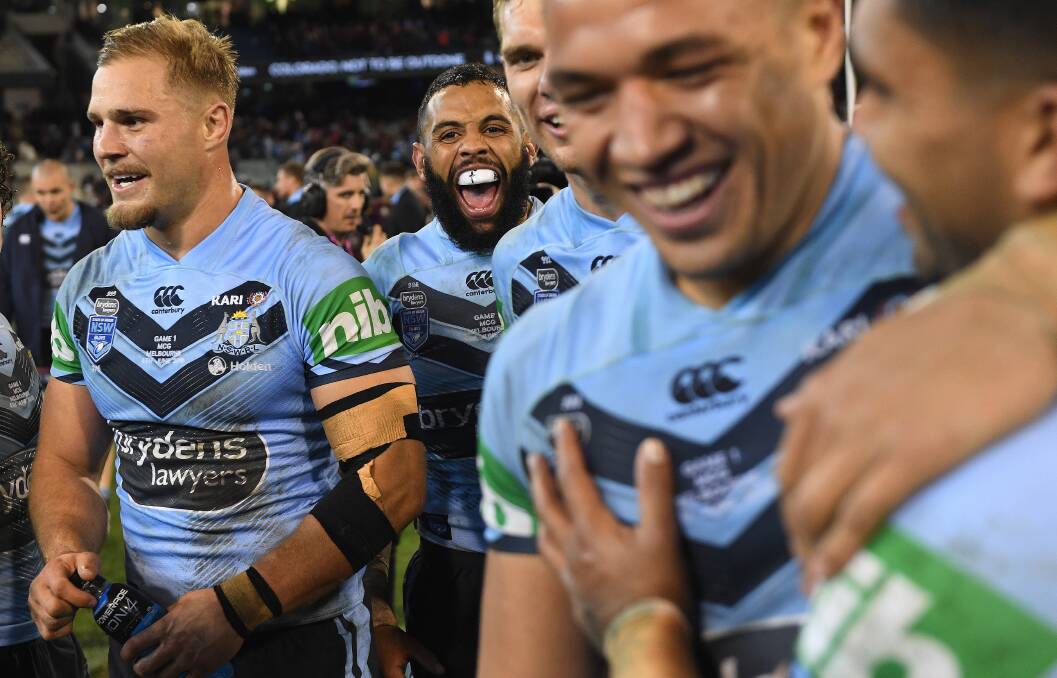 MOMENT TO SAVOUR: Cootamundra junior Jack de Belin (left) soaks in the 22-14 win over Queensland in Origin I after debuting for NSW at the MCG on Wednesday. 