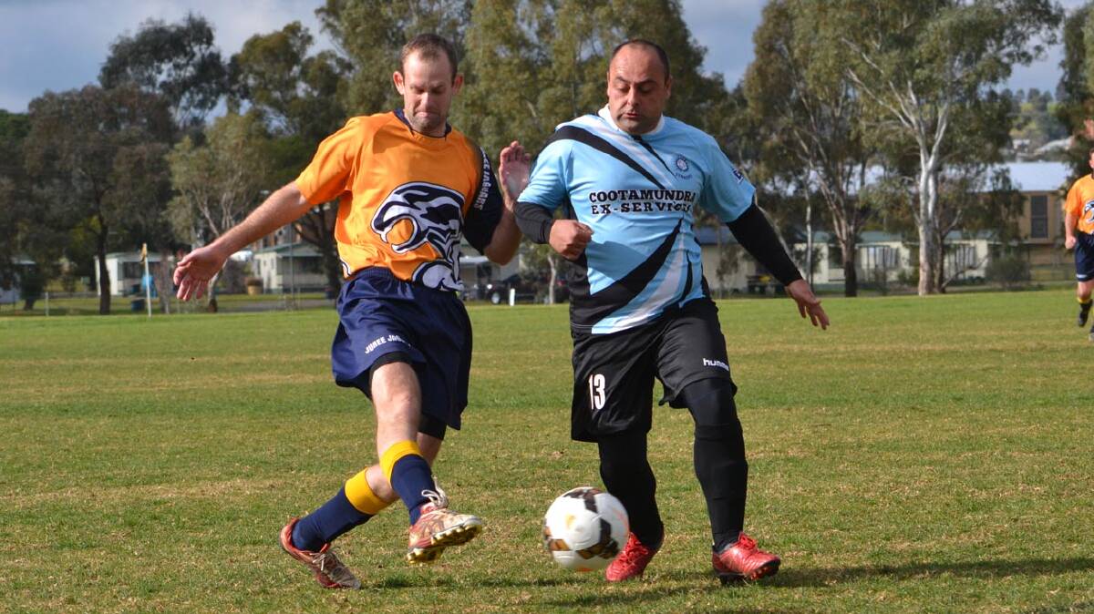 TECHNIQUE: New Cootamundra coach Mo Hassani (right) wants to develop his younger players and ensure they have a strong base skill level for the Pascoe Cup.