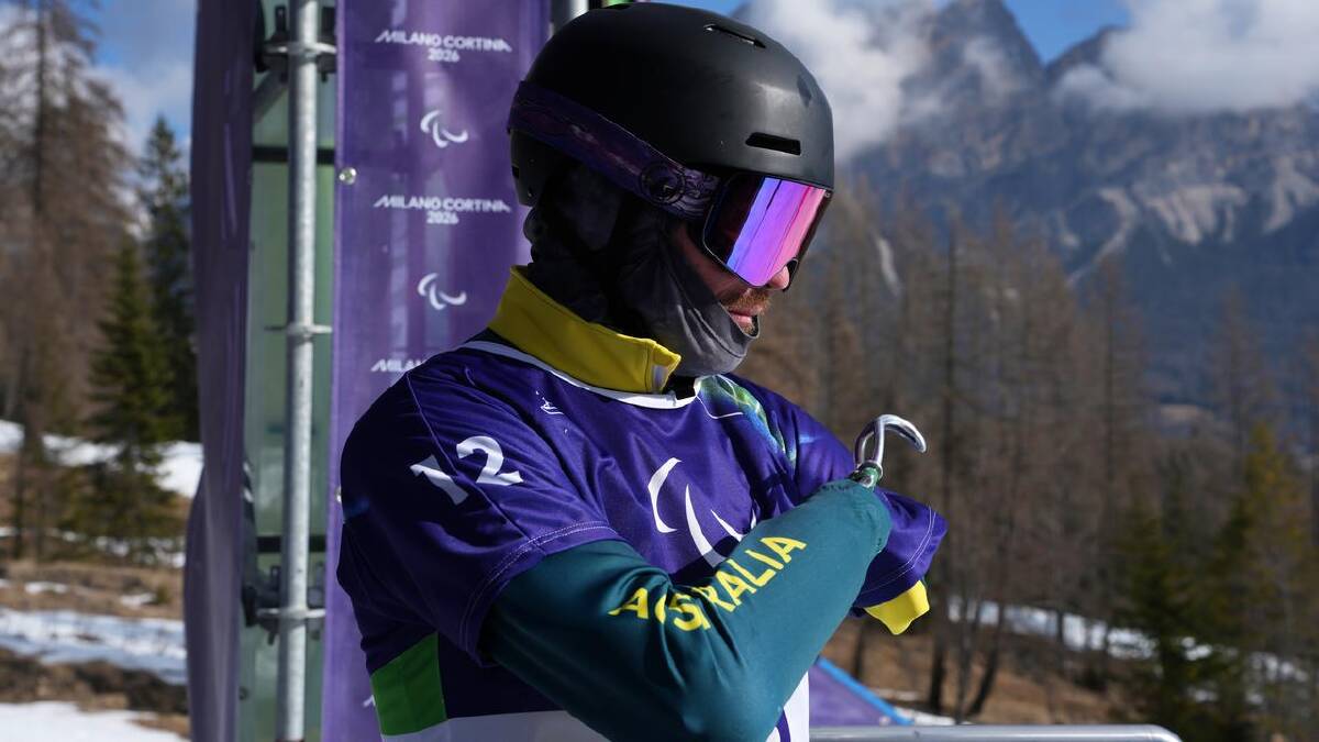 Sean Pollard finished ninth in the SB-UL snowboard cross and 12th in the banked slalom. (AP PHOTO)