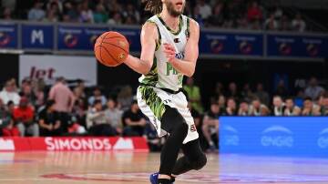 A knee injury to Craig Moller has soured the SEM Phoenix's 90-79 NBL win over the NZ Breakers. (James Ross/AAP PHOTOS)