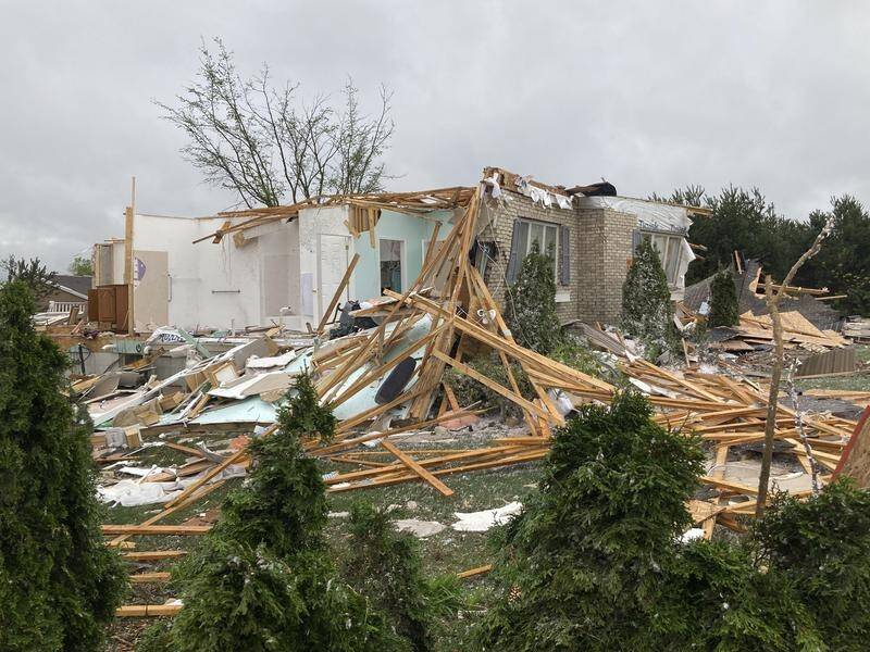 A rare tornado has hit a Michigan community, killing at least two people.