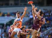 Brisbane have improved their AFL season record to 9-2 after a 14-point win over GWS at the Gabba.