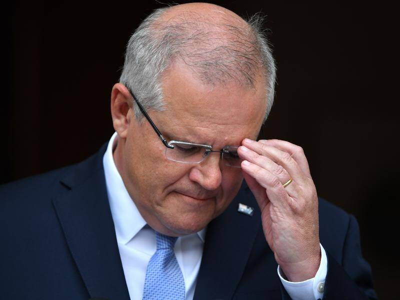 Prime Minister Scott Morrison's approval rating has tumbled eight points to 37 per cent.