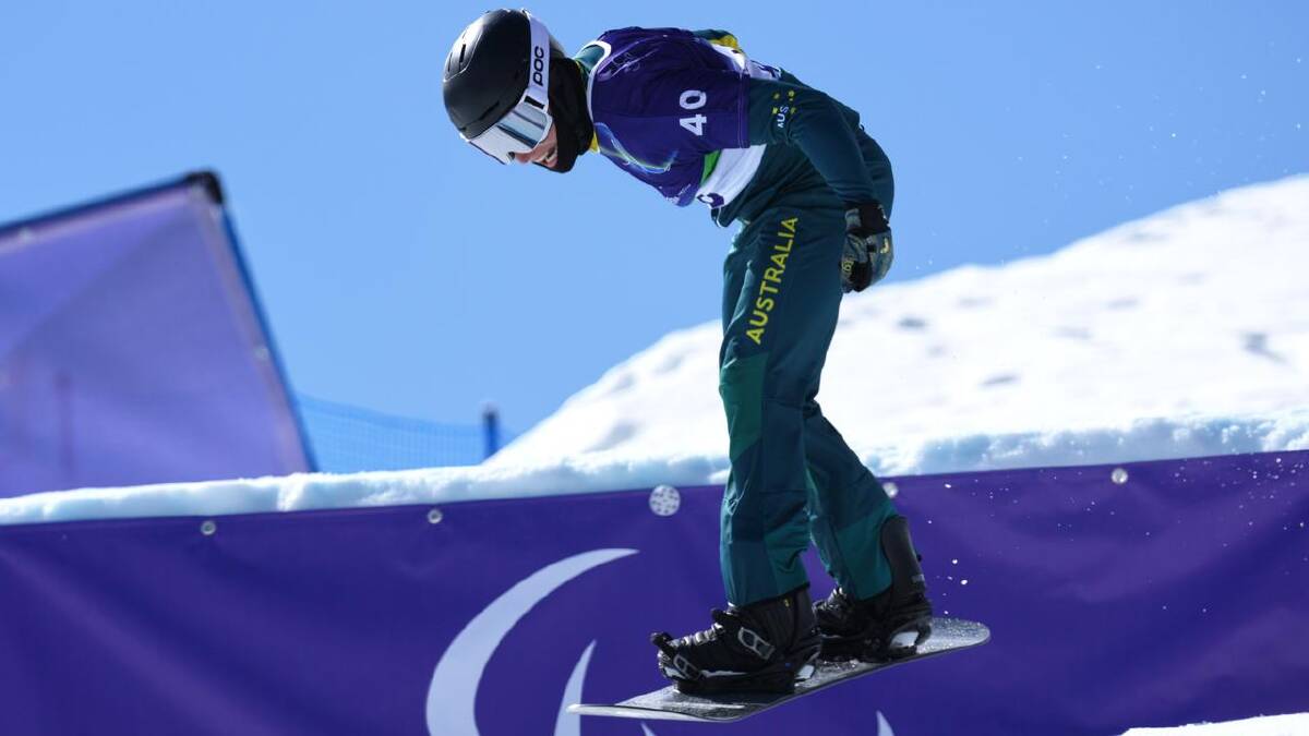 Para-snowboard star Ben Tudhope on his way to another medal in Cortina. (AP PHOTO)