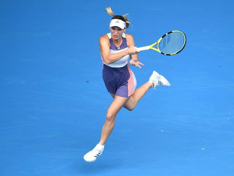 Caroline Wozniacki in action against USA's Kristie Ahn in the first round at the Australian Open.