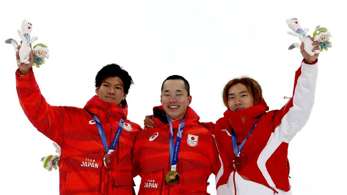 Kira Kimura (c) and Ryoma Kimata (l) produced a 1-2 finish for Japan with China's Su Yiming third. (EPA PHOTO)